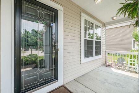 1883 Caplinger Dr, Grove City, OH 43123 - entrance to property featuring covered porch