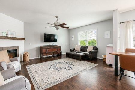 1883 Caplinger Dr, Grove City, OH 43123 - living room with plenty of natural light, a ceiling fan, and dark wood-type flooring