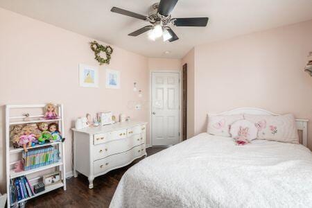 1883 Caplinger Dr, Grove City, OH 43123 - bedroom featuring dark wood-style floors and a ceiling fan