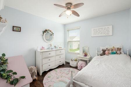 1883 Caplinger Dr, Grove City, OH 43123 - bedroom featuring dark wood-style flooring and ceiling fan