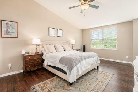 1883 Caplinger Dr, Grove City, OH 43123 - bedroom featuring lofted ceiling, wood finished floors, and a ceiling fan
