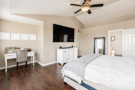 1883 Caplinger Dr, Grove City, OH 43123 - bedroom featuring vaulted ceiling, wood finished floors, and ceiling fan