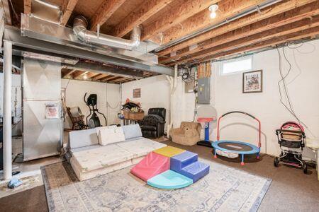 1883 Caplinger Dr, Grove City, OH 43123 - basement with heating unit and electric panel