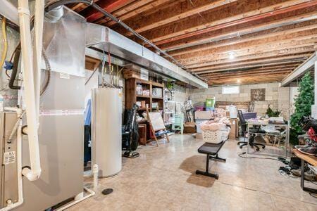 1883 Caplinger Dr, Grove City, OH 43123 - basement featuring water heater and heating unit