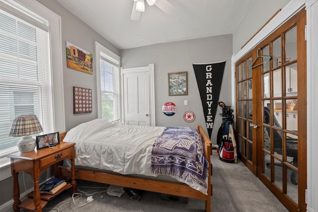 1561 Glenn Ave, Columbus, OH 43212 - bedroom with carpet flooring, french doors, and a ceiling fan