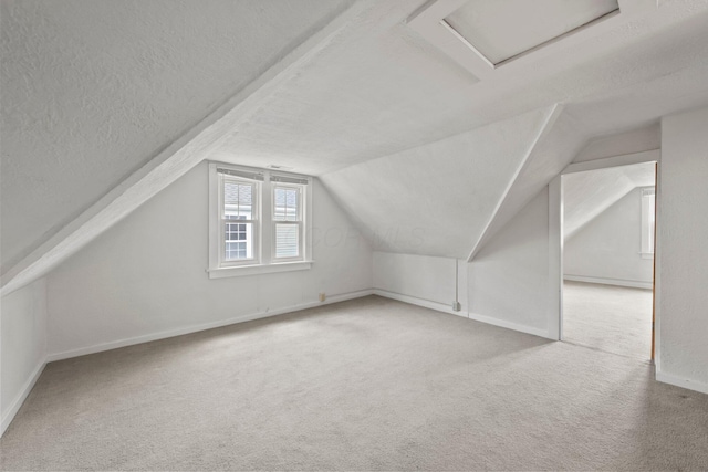 1561 Glenn Ave, Columbus, OH 43212 - bonus room with attic access, a textured ceiling, carpet, and vaulted ceiling
