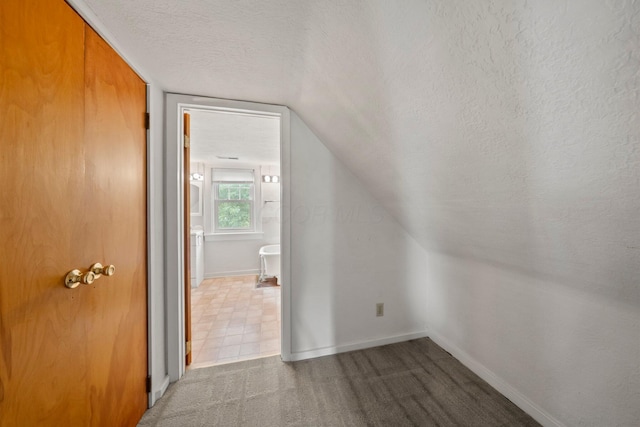 1561 Glenn Ave, Columbus, OH 43212 - bonus room with a textured ceiling, lofted ceiling, and carpet floors