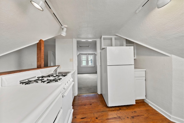 1561 Glenn Ave, Columbus, OH 43212 - kitchen featuring freestanding refrigerator, a textured ceiling, dark wood-style floors, lofted ceiling, and a textured wall