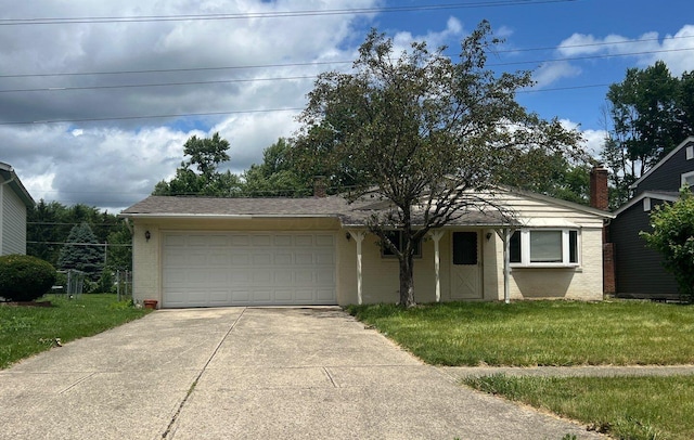 2652 Landsburn Dr, Columbus, OH 43231 - view of front of property featuring brick siding, a garage, driveway, and a front yard