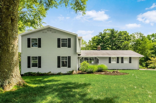 277 Mill Race Rd, Granville, OH 43023 - traditional-style house with a front lawn and a chimney