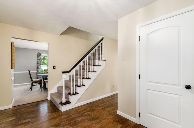 277 Mill Race Rd, Granville, OH 43023 - staircase featuring baseboards and wood-type flooring