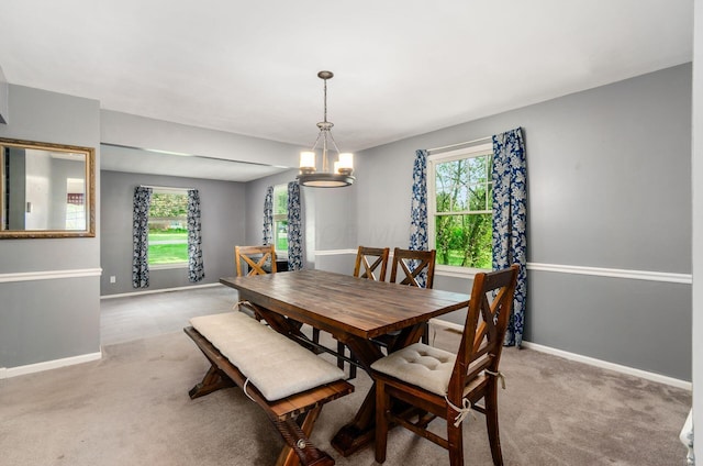 277 Mill Race Rd, Granville, OH 43023 - dining room with plenty of natural light, light carpet, and a chandelier