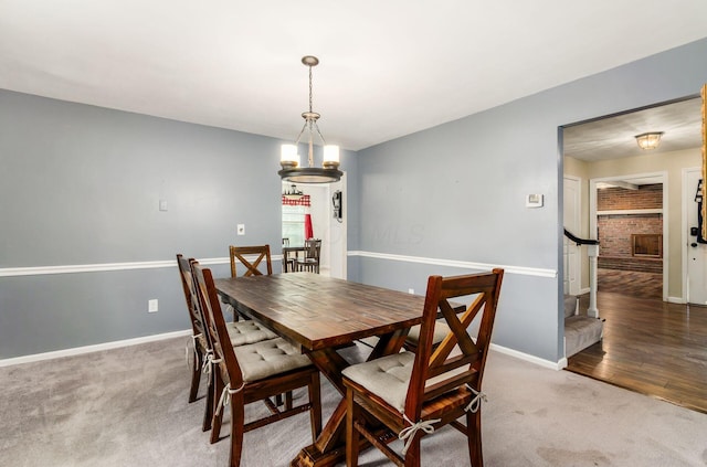 277 Mill Race Rd, Granville, OH 43023 - dining space with carpet and stairway