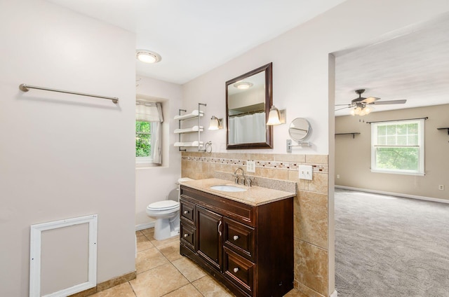 277 Mill Race Rd, Granville, OH 43023 - full bathroom featuring vanity, plenty of natural light, ceiling fan, and backsplash