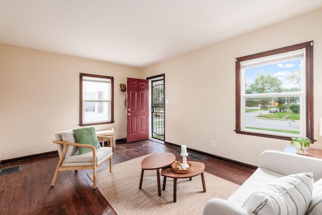 854 E Weber Rd, Columbus, OH 43211 - living area with plenty of natural light and dark wood-style flooring