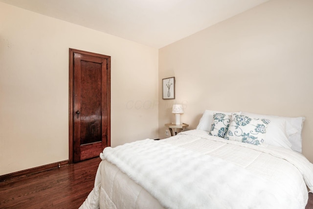 854 E Weber Rd, Columbus, OH 43211 - bedroom with dark wood-type flooring and baseboards