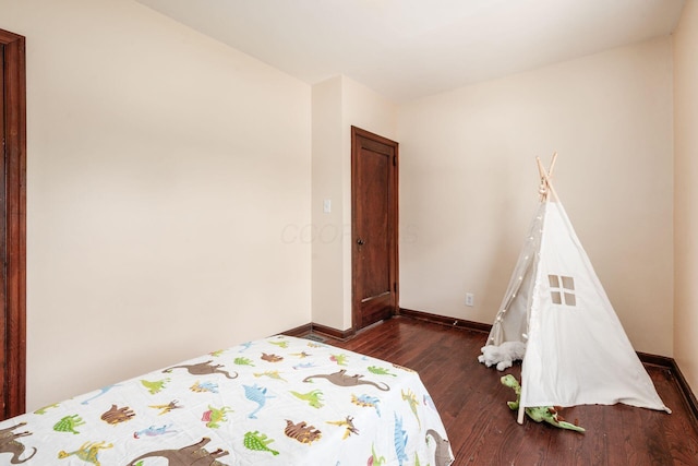 854 E Weber Rd, Columbus, OH 43211 - bedroom featuring wood finished floors and baseboards