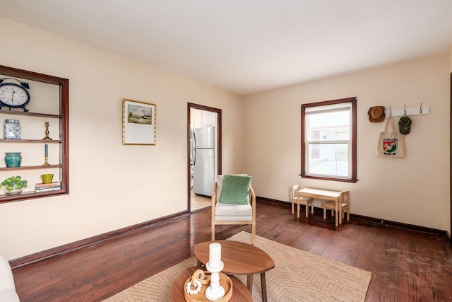 854 E Weber Rd, Columbus, OH 43211 - living area with dark wood-type flooring and baseboards