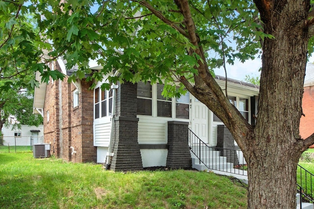 87 N Warren Ave, Columbus, OH 43204 - view of property exterior with brick siding and a cooling unit