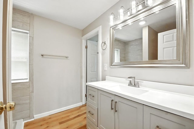 87 N Warren Ave, Columbus, OH 43204 - bathroom featuring vanity and wood finished floors