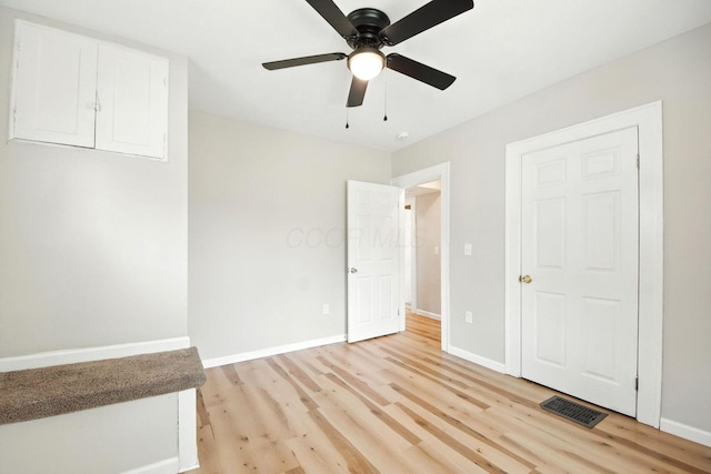 87 N Warren Ave, Columbus, OH 43204 - unfurnished bedroom with light wood-style floors and a ceiling fan