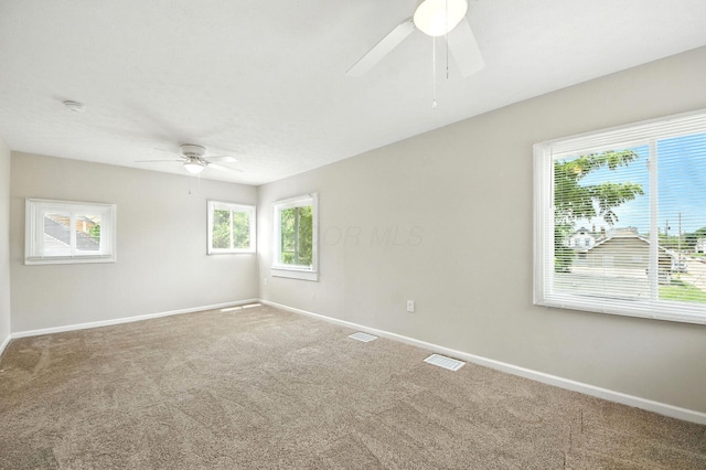 87 N Warren Ave, Columbus, OH 43204 - carpeted empty room with a ceiling fan and a smoke detector