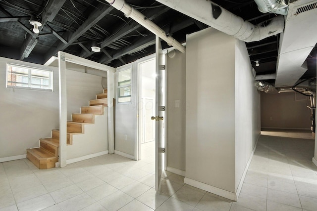 87 N Warren Ave, Columbus, OH 43204 - below grade area with stairway and tile patterned floors