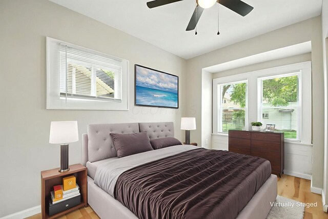 87 N Warren Ave, Columbus, OH 43204 - bedroom with light wood-style floors and ceiling fan