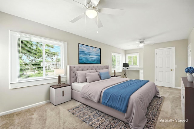 87 N Warren Ave, Columbus, OH 43204 - bedroom with light carpet, multiple windows, and ceiling fan