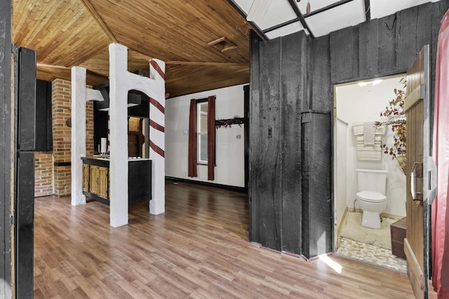 27380 Miller Rd, Rockbridge, OH 43149 - unfurnished living room with wood finished floors, wood ceiling, and vaulted ceiling