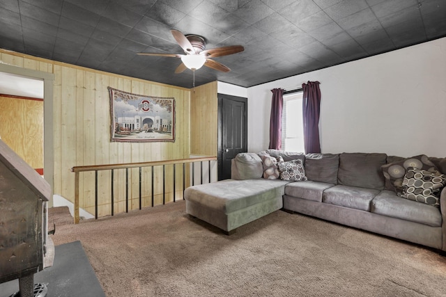 27380 Miller Rd, Rockbridge, OH 43149 - living room featuring a ceiling fan, carpet, and wooden walls