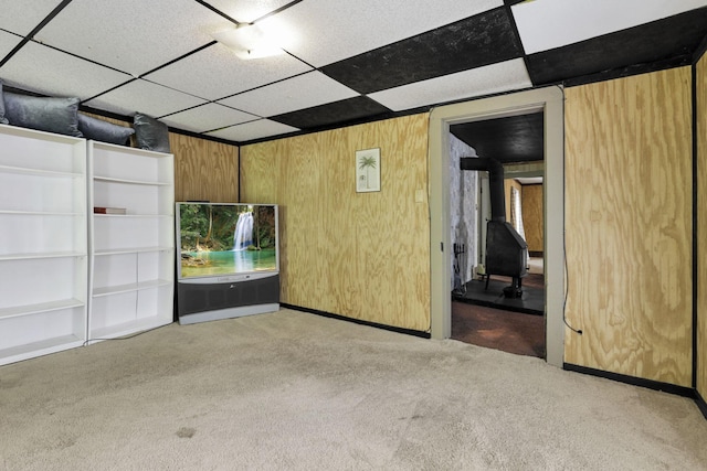 27380 Miller Rd, Rockbridge, OH 43149 - spare room with a drop ceiling, carpet, and wood walls