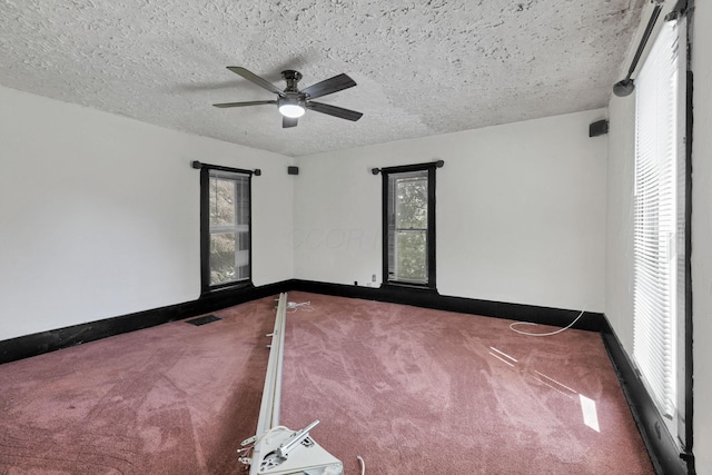 27380 Miller Rd, Rockbridge, OH 43149 - empty room featuring carpet, ceiling fan, and a textured ceiling