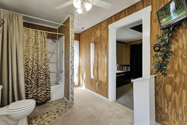 27380 Miller Rd, Rockbridge, OH 43149 - full bathroom featuring wood walls, a ceiling fan, and shower / bath combo with shower curtain