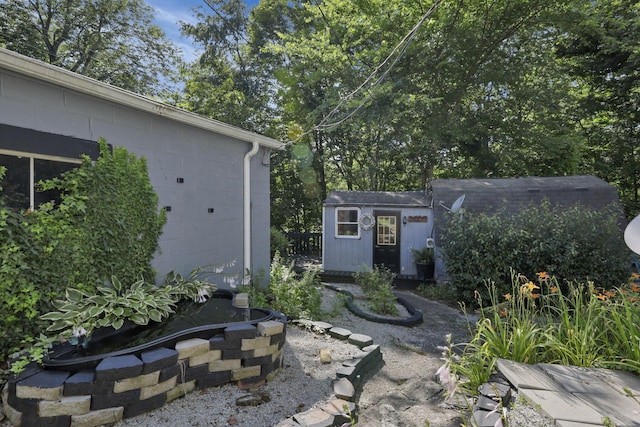 27380 Miller Rd, Rockbridge, OH 43149 - view of patio with an outbuilding and a garage