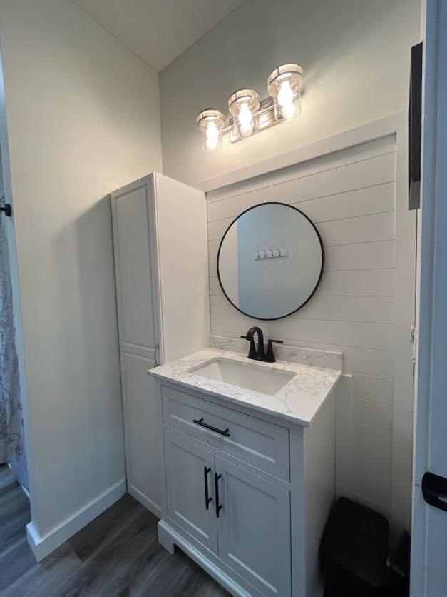 450 Village Ridge Ct, Powell, OH 43065 - bathroom with wood finished floors and vanity