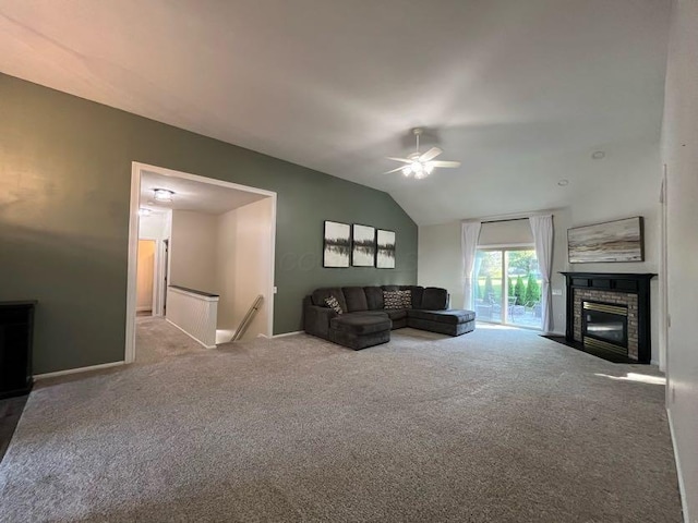 450 Village Ridge Ct, Powell, OH 43065 - living area with a ceiling fan, vaulted ceiling, carpet floors, and a fireplace