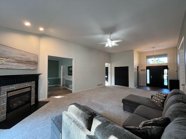 450 Village Ridge Ct, Powell, OH 43065 - carpeted living room with a ceiling fan and a brick fireplace