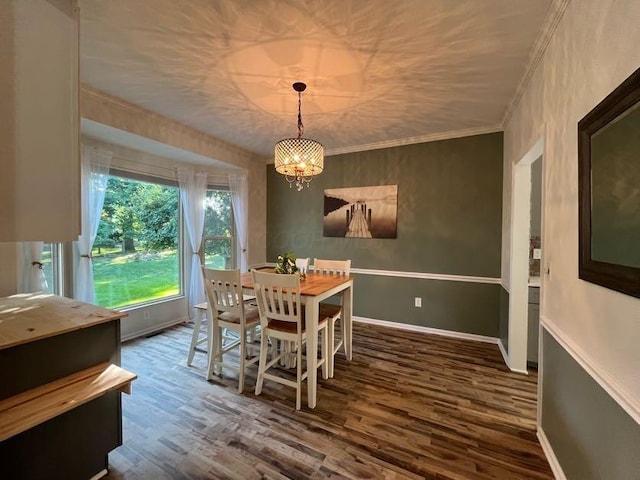 450 Village Ridge Ct, Powell, OH 43065 - dining room featuring wood finished floors, crown molding, and a chandelier