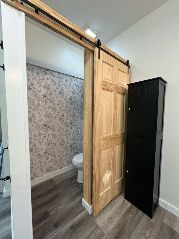 450 Village Ridge Ct, Powell, OH 43065 - bathroom with wood finished floors