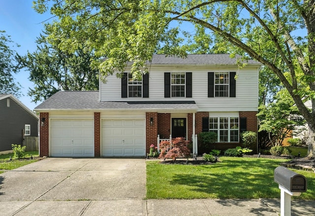 1817 Ibson Dr, Powell, OH 43065 - traditional home with brick siding, driveway, a front lawn, and a garage