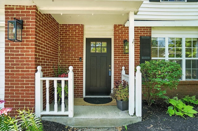 1817 Ibson Dr, Powell, OH 43065 - entrance to property featuring brick siding and a porch