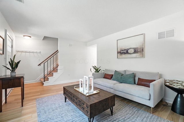 1817 Ibson Dr, Powell, OH 43065 - living area with light wood-type flooring and stairs