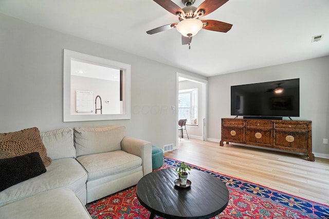 1817 Ibson Dr, Powell, OH 43065 - living room featuring ceiling fan and wood finished floors