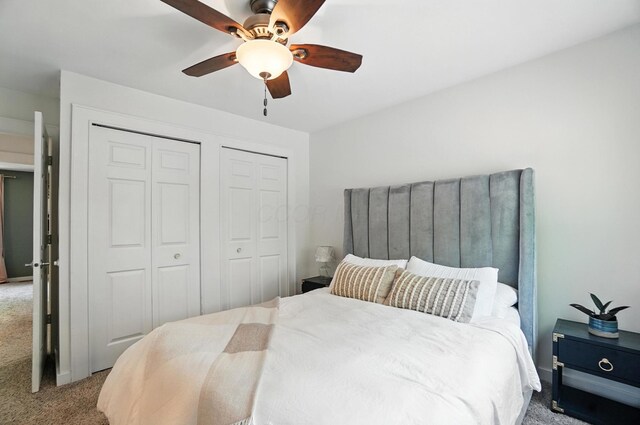 1817 Ibson Dr, Powell, OH 43065 - carpeted bedroom featuring ceiling fan and multiple closets