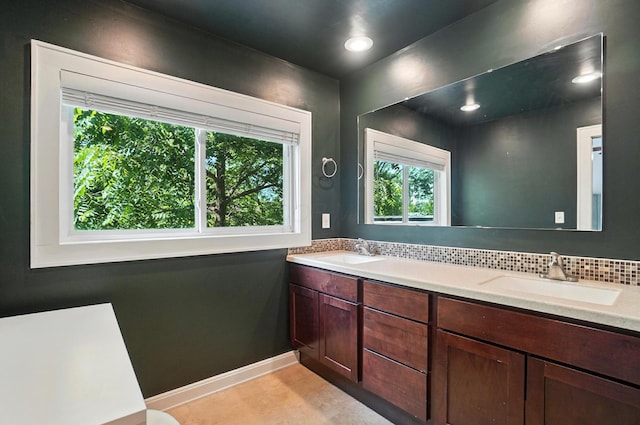1817 Ibson Dr, Powell, OH 43065 - bathroom with double vanity and tasteful backsplash