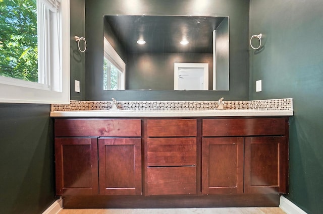 1817 Ibson Dr, Powell, OH 43065 - full bathroom with double vanity and backsplash