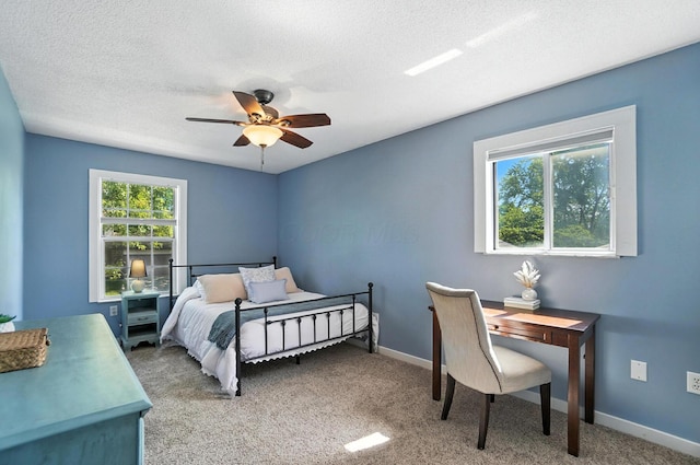 1817 Ibson Dr, Powell, OH 43065 - carpeted bedroom featuring a textured ceiling and ceiling fan