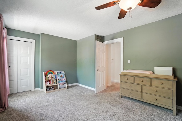 1817 Ibson Dr, Powell, OH 43065 - bedroom with carpet flooring, a textured ceiling, ceiling fan, and a closet