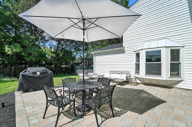 1817 Ibson Dr, Powell, OH 43065 - view of patio / terrace featuring grilling area, a storage shed, an outdoor hangout area, and outdoor dining space